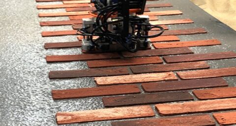 Nieuwe verspuitbare minerale lijmmortel voor steenstrips versnelt fabrieksmatig bouwen